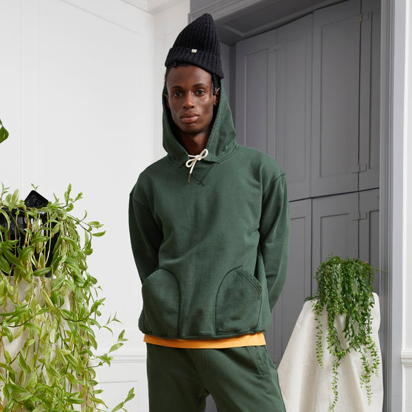 Model wearing Admiral Henshaw Hoodie - Men's Hooded Top - Forest Green