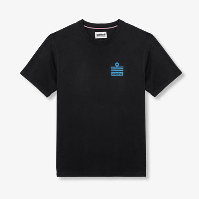 Man wearing a black Admiral t-shirt with an Admiral ensign blue logo on a light grey background